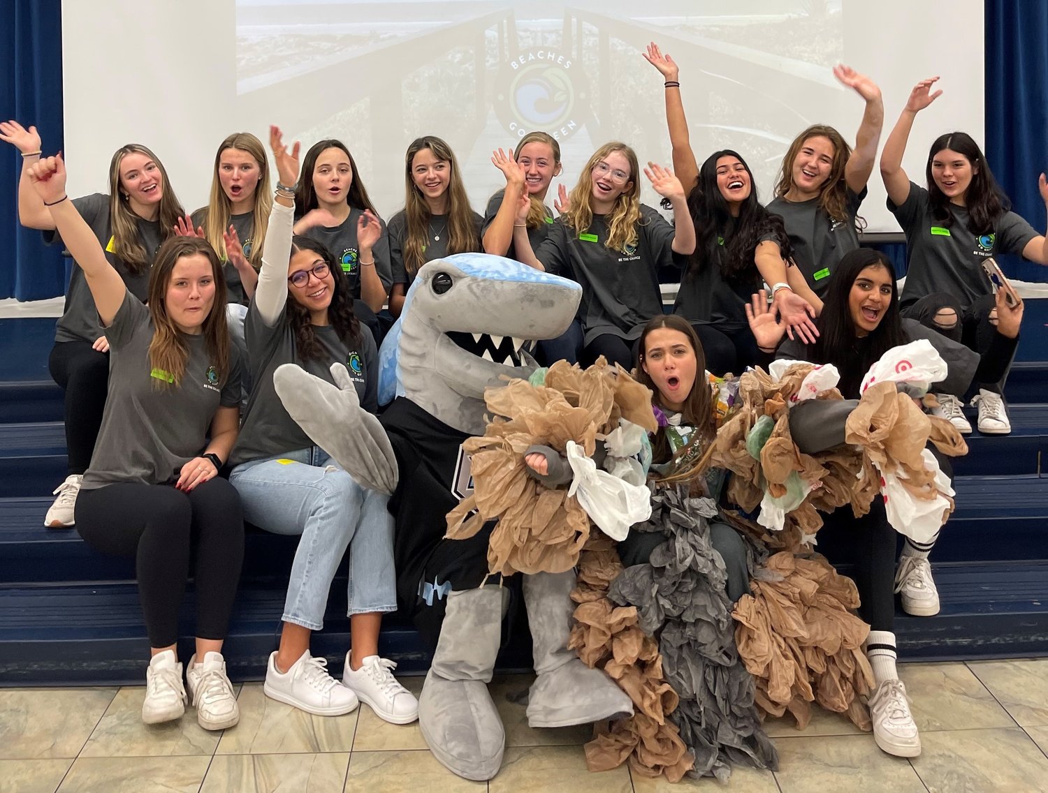 Members of Ponte Vedra High School’s Beaches Go Green and Bruce the shark visit Ocean Palms Elementary to talk about reducing waste.